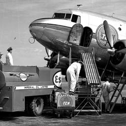 Esso Employees Refuel an Airplane, 1948
