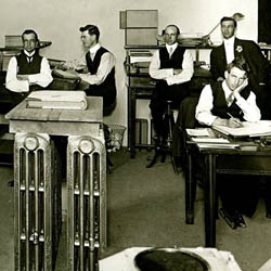 Office Workers Seated at Desks, 1912