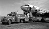 Esso Employees Refuel an Airplane