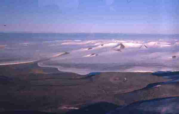 View from Otter of margins of ice cap with several nunataks, Axel Heiberg Island.