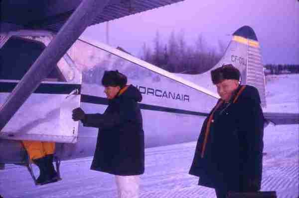 Lawrence Bryson and Chick Terry boarding Norcanair Beaver. 12/69