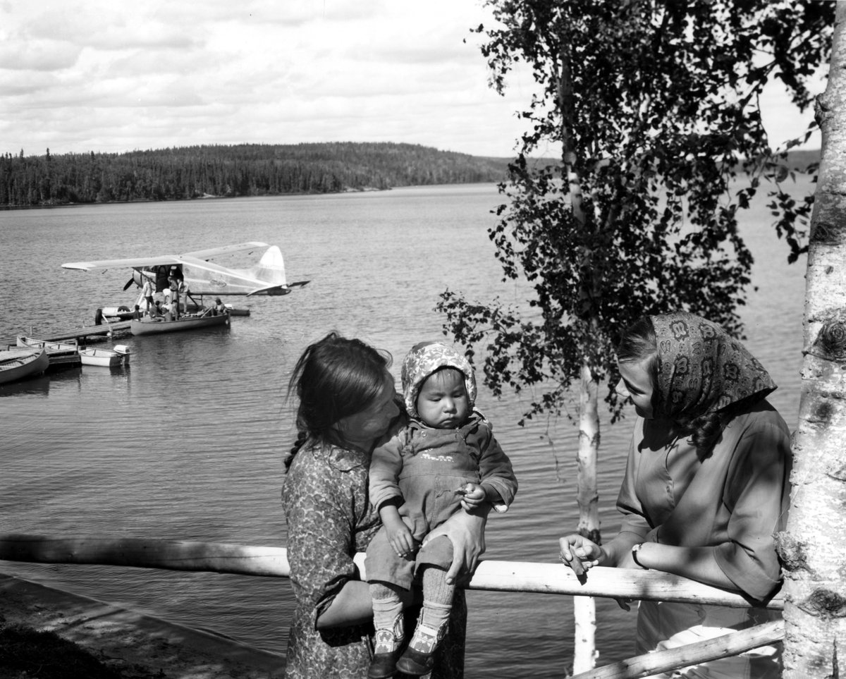 Indigenous Woman with Young Child at McIntosh Lake, Institute for Northern Studies fonds