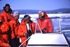 Bear tracking team in boat., Hans Dommasch fonds