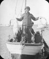 Inuk hunter with two arctic swans., Department of Physics fonds