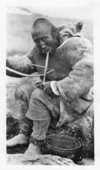 Eskimo Drilling Bone With a Bow Drill, Institute for Northern Studies fonds
