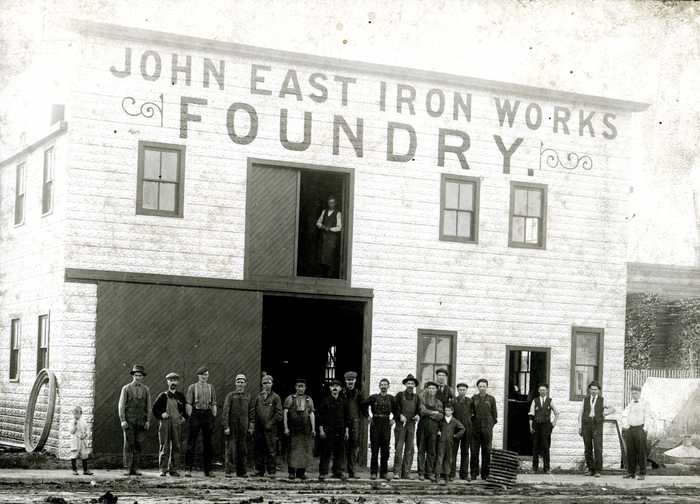 Workers in Front of John East Iron Works