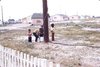 Children at water hoses. 8/71, R.M.  Bone  fonds