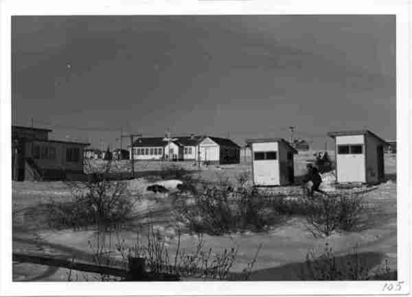 Band Council Hall centre; Old Nursing Station left; Indian Affairs storage shed right; B.L. 1971.