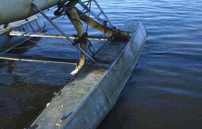 Mammoth tusk strapped to float of Beaver airplane