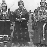 Three Indigenous Women in Elaborate Garments