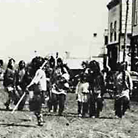 Sioux Dance (probably Wahpeton Dakota) on Main Street, Prince Albert, NWT